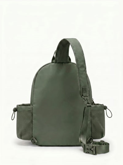 Back view of Green Rally Cross Body Backpack showing crossbody strap and padded paddle sleeve