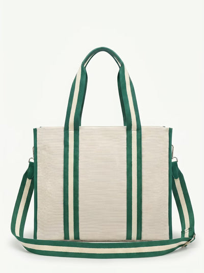 Back view of Green Rally All Day Tote showing crossbody strap and padded paddle sleeve