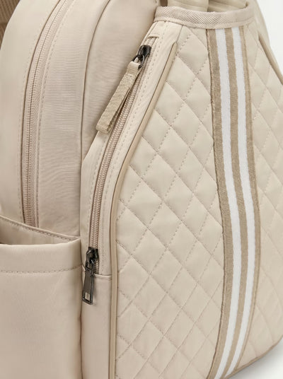 Padded paddle sleeve detail on Rally Cross Body Backpack in Beige