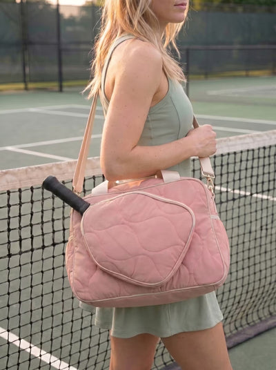 Rally All Day Duffle in Pink at the pickleball court with paddles
