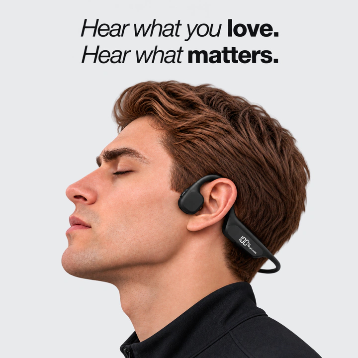 Hear what you love. Hear what matters. A rider wearing Rally Audio, the speaker resting outside the ear